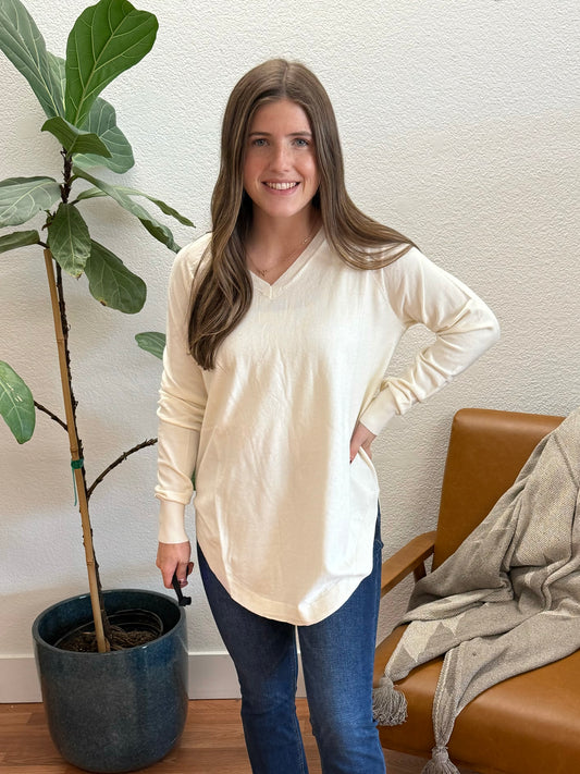 Cream Curve Hem Sweater