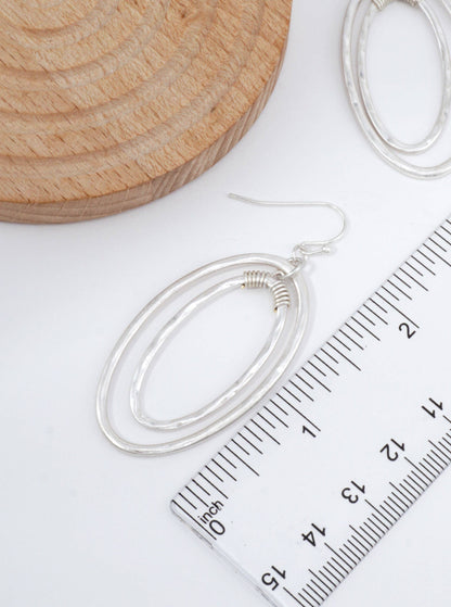 Silver Hammered Oval Artistic Dangle Earrings