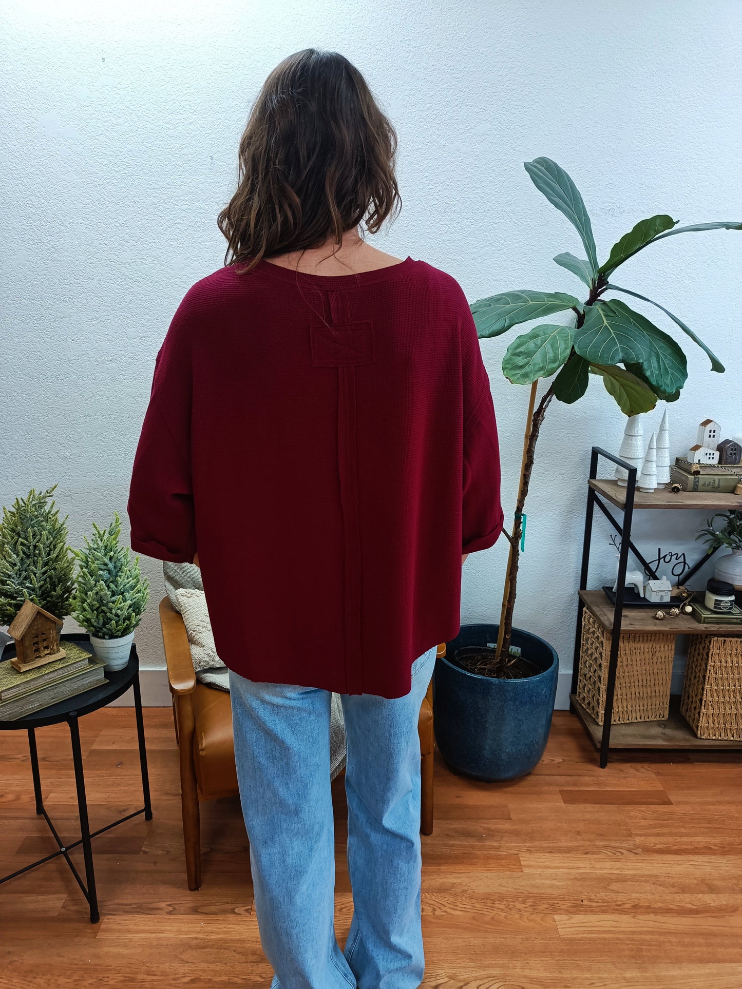 Cabernet Double Knit Exposed Seam Curved Hem Top