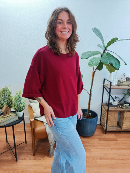 Cabernet Double Knit Exposed Seam Curved Hem Top